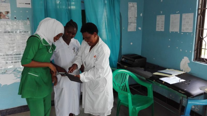 Community Health Workers review their mobile data collection tools questions for bias