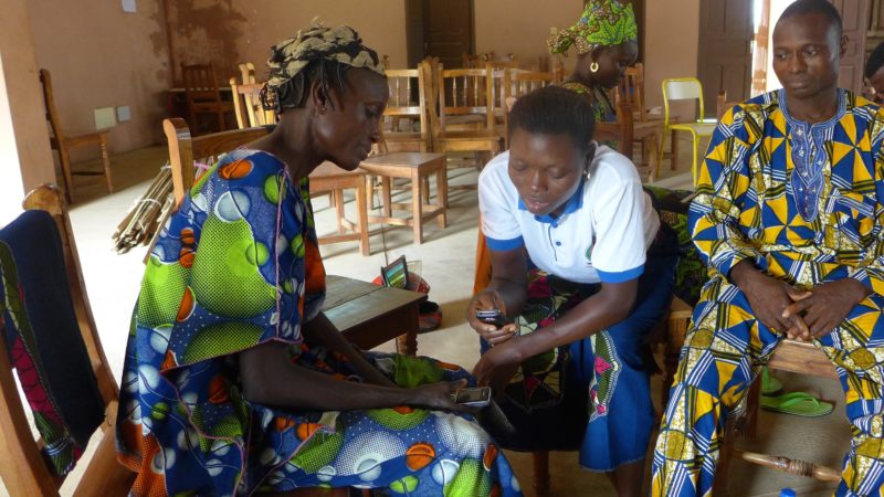 Community Health Workers learn how to use a mobile data collection app